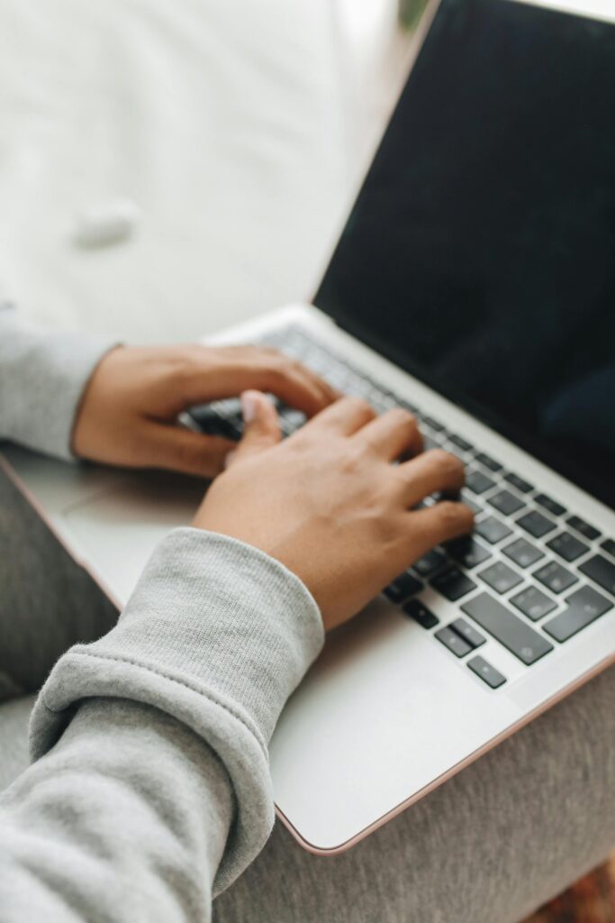 typing on laptop